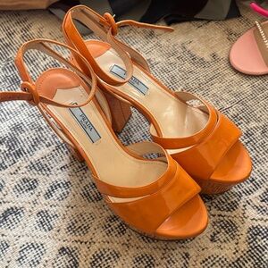 Prada Women's Vibrant Orange Platform Patent Leather  Heels 37